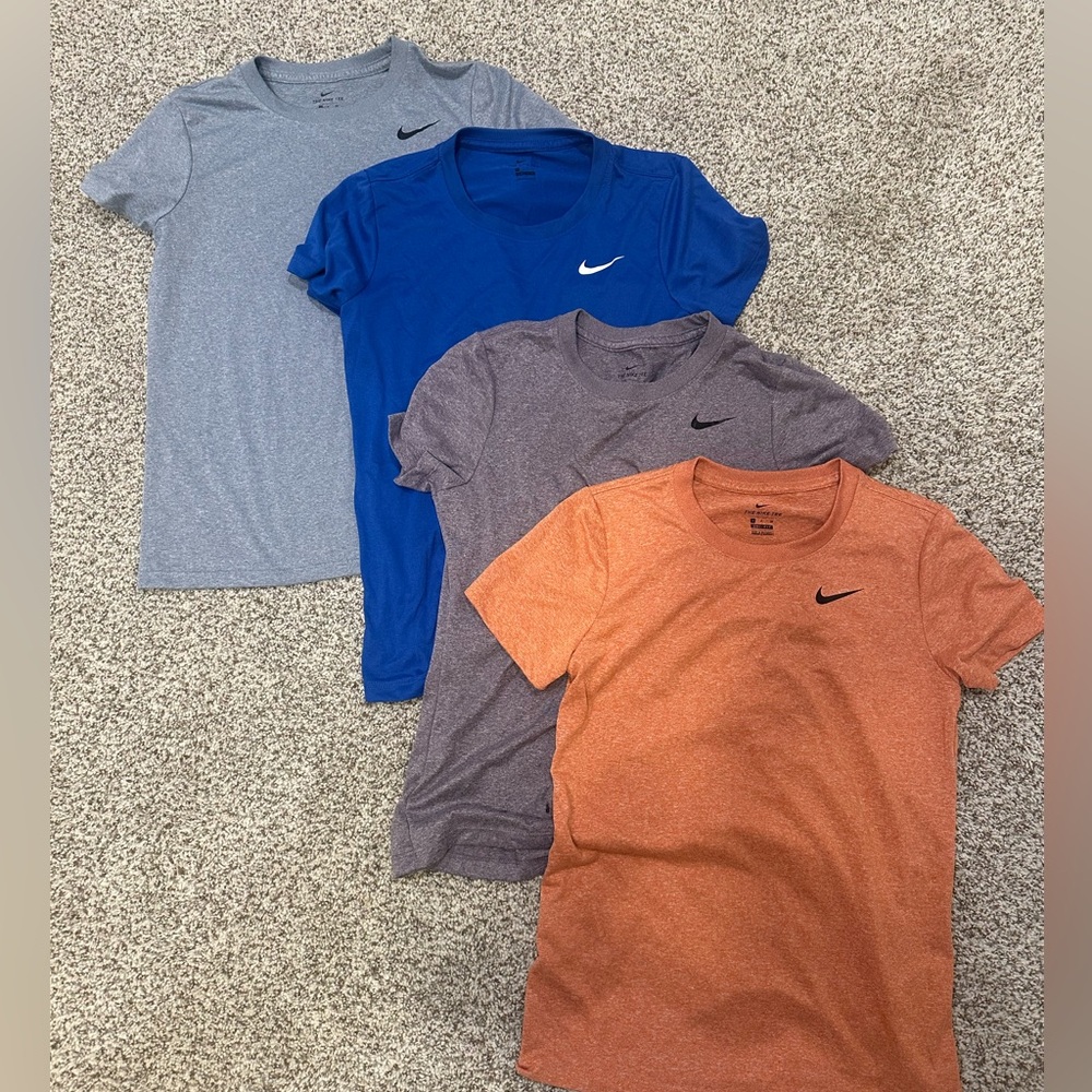 4 pack of assorted nike dry-fit tees, all size small